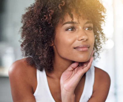 Portrait of a woman admiring her appearance