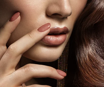 Close-up on a female model's full lips