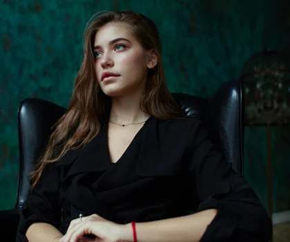 Woman sitting in a chair